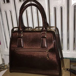 Brown handbag.